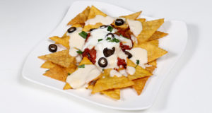 Nachos With Salsa And Cheese Sauce
